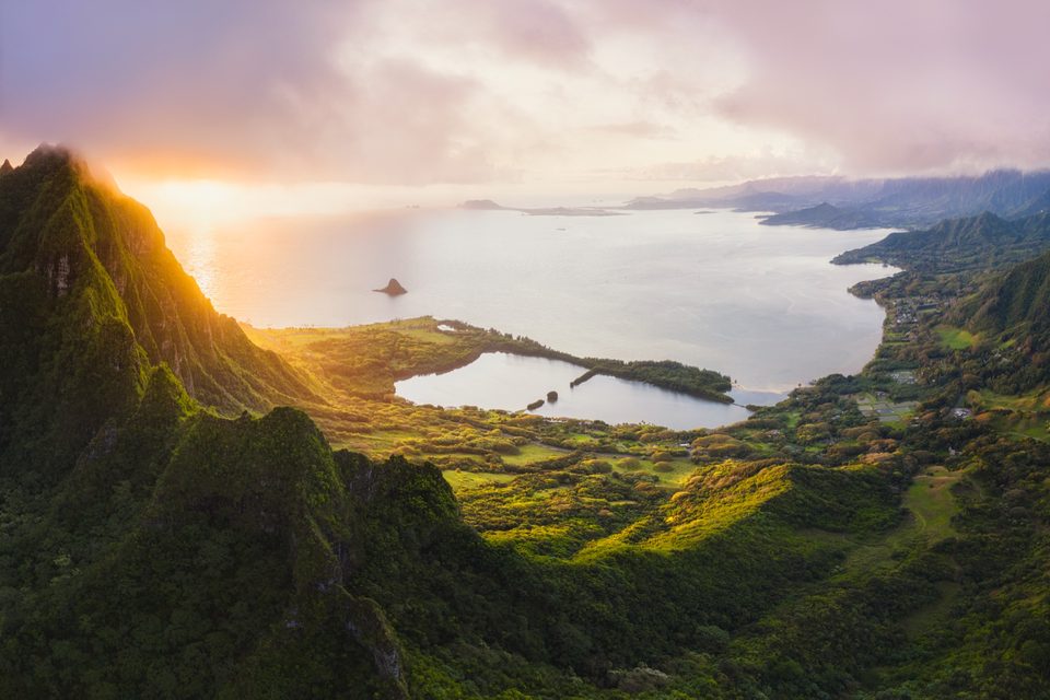 Sunrise over Kāneʻohe Bay from the ridge above Hakipuʻu, with Mokoliʻi islet and the fishpond below